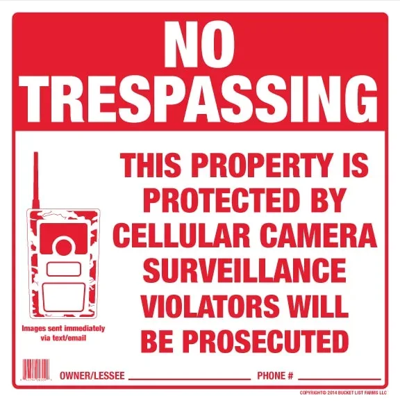 No Trespassing Sign - this property is protected by cellular camera surveillance violators will be prosecuted